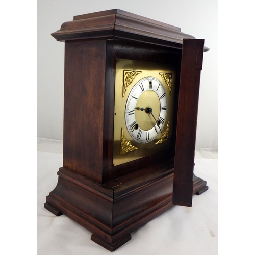 53 - An American mantel clock having Art Nouveau decorative details.
