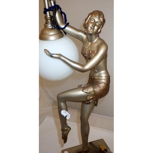 60 - A table lamp comprising an Art Deco spelter figurine on an alabaster slab plinth.  A/F requires re-w... 