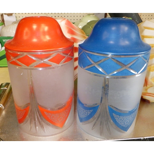 62 - Four glass lamp shades being two pairs of matching designs but different colourways.