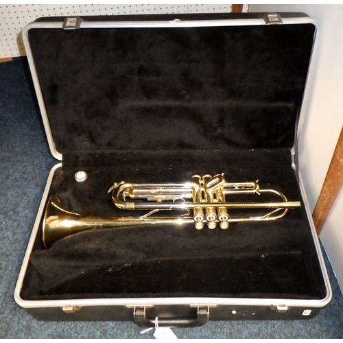 96 - A cased Blessing trumpet (af dents)