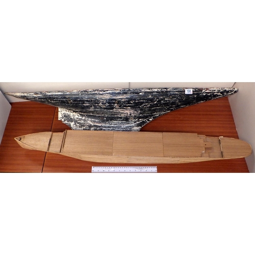 190 - A pond yacht hull, 121cm long; a wooden model of a liner hull. (2)