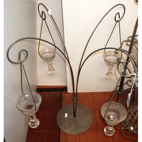 200 - A metal lantern in middle eastern manner; a four branch candle holder; a two tier stand. (3)