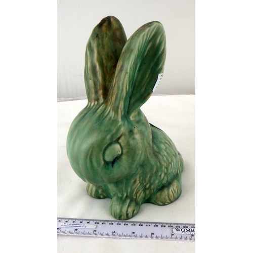 214 - A Sylvac rabbit, green glaze, 25cm tall