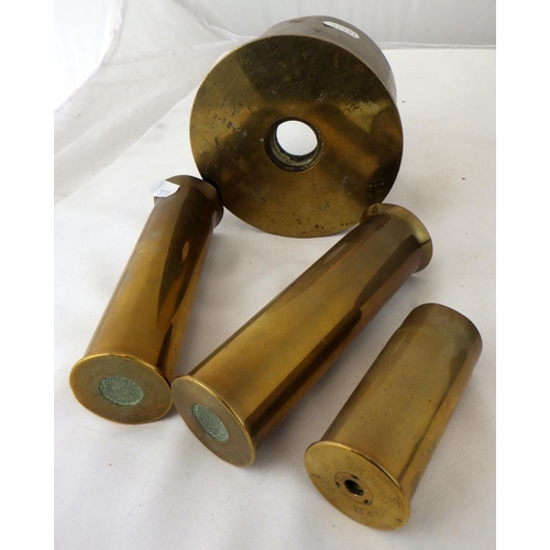 217 - A pair of RAF WW2 MkVIII flying goggles; a British WW2 Civil Defence helmet; four brass shell cases.... 