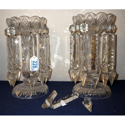 228 - A pair of clear glass lustres, a/f.   Each 25cm