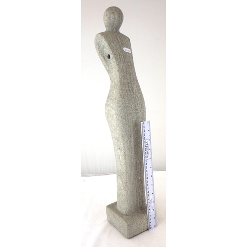 243 - An abstract figurine.  61cm tall.