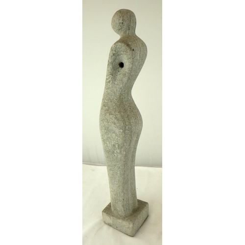 243 - An abstract figurine.  61cm tall.