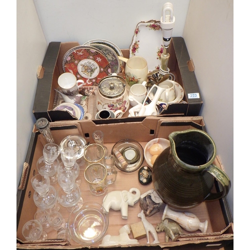 259 - Two boxes of misc glass and ceramics to include Royal Worcester wall plates, carved stone animals et... 