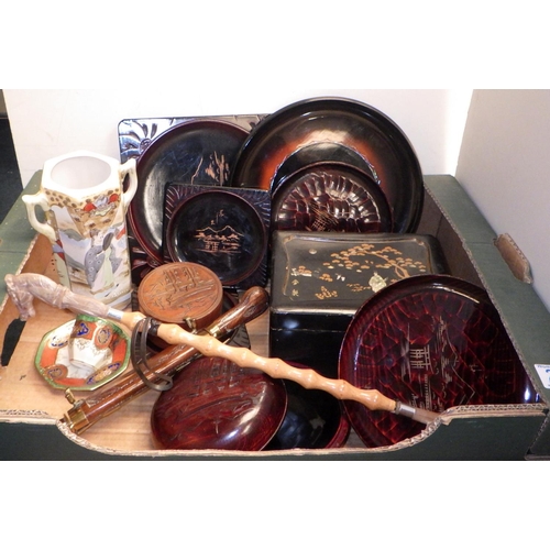 261 - A group of Oriental carved plates, bowls together with a lacquered box, carving set etc