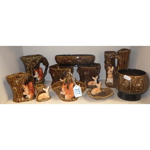 277 - A group of brown Sylvac planters, vases etc