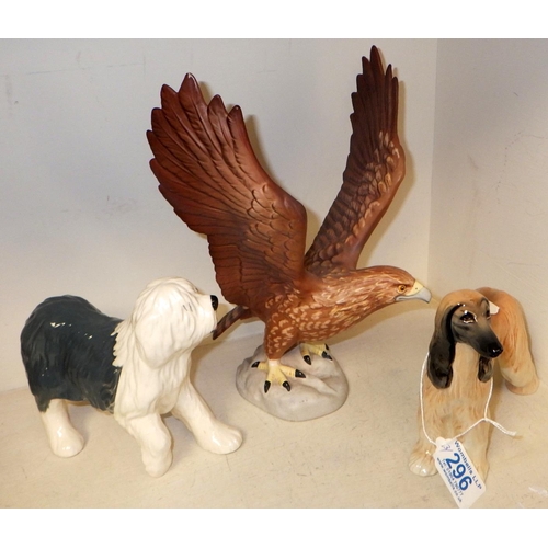 296 - Two Beswick dogs and a Golden Eagle (3)