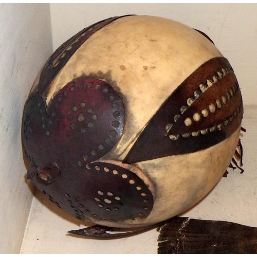 301 - A unusual leather model of a fish together with a carved hardwood mask etc (4)