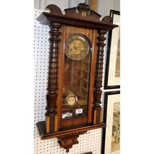 326 - A 19thC Vienna wall clock 80cm long