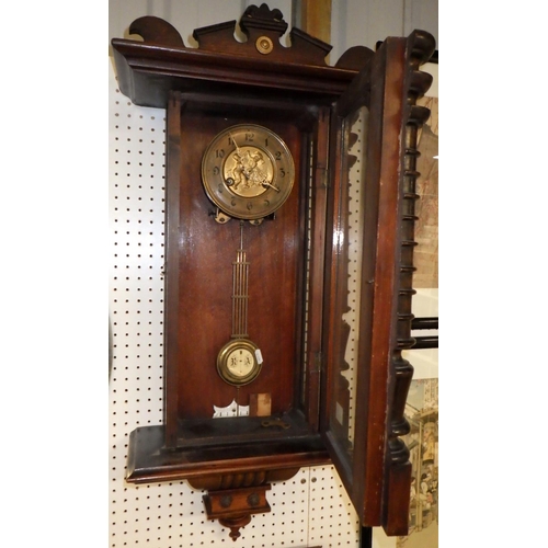 326 - A 19thC Vienna wall clock 80cm long