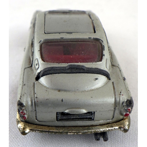 395 - A Corgi Toys die-cast James Bond Aston Martin DB5 in silver together with a Dinky Rover 75 & a Dinky... 