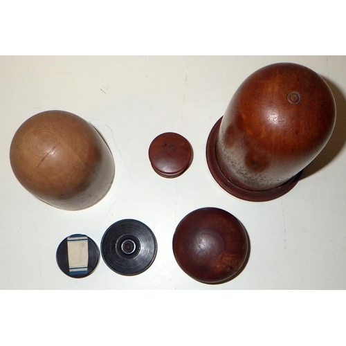 399 - Treen: two purse shapers; two pill pots; two lignum vitae seal impression boxes.  (6)