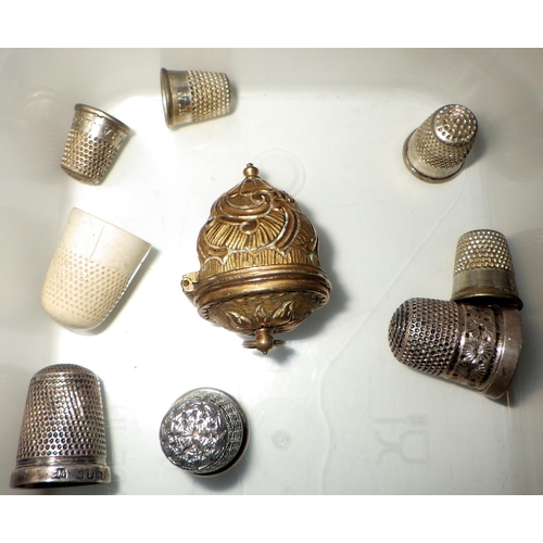 402 - A brass thimble case in Georgian 18th cent manner, possibly part of a chatelaine, 37mm tall; three s... 