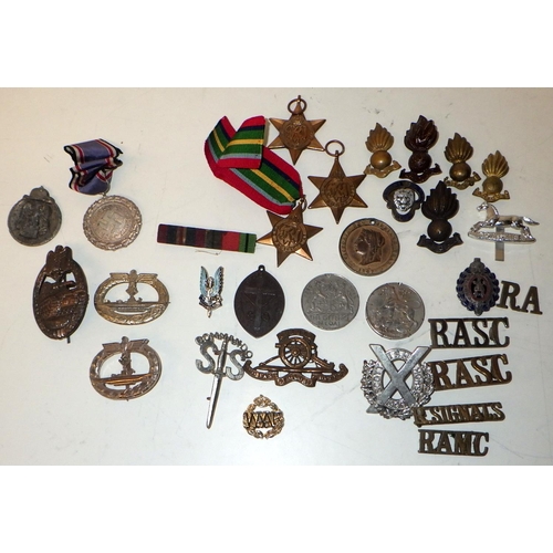 404 - Various military interest medals and badges; other badges etc.