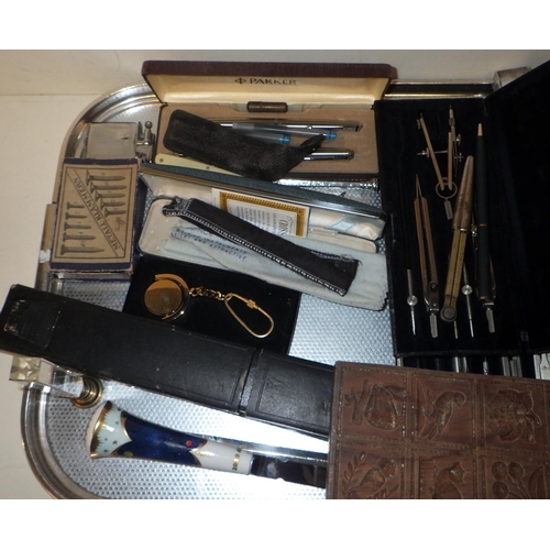 406 - A collectors' lot including Cross pens, propelling pencils, drawing sets, pince nez, a wooden ginger... 