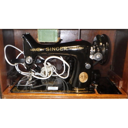 448 - Singer sewing machine in case  A/F requires re-wiring.