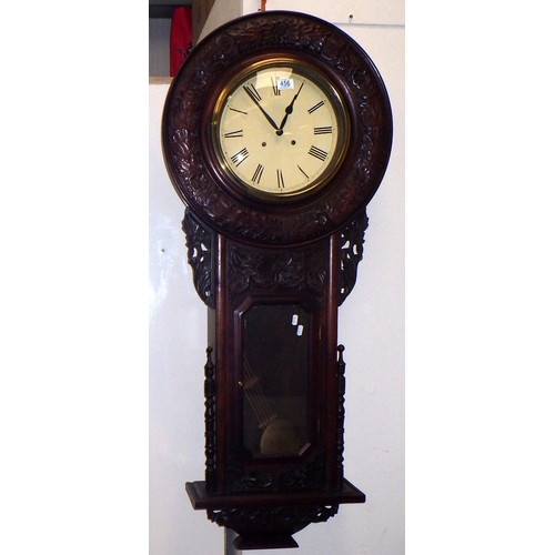 456 - A carved drop dial wall clock, 134cm tall