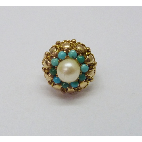 417 - A cluster ring, comprising a central pearl surrounded by a halo of turquoise, unmarked yellow metal.... 