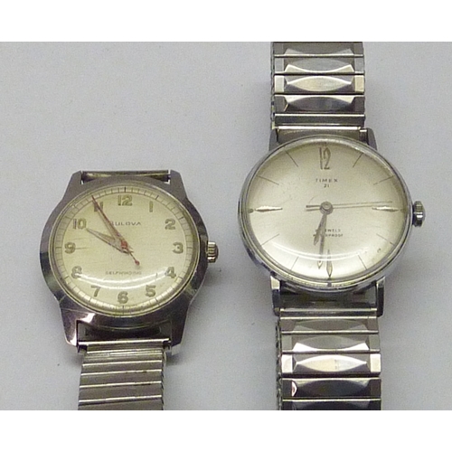 428 - A Timex 21 manual wind chrome cased wristwatch, 32mm across, in original box; a Bulova Self-Winding ... 