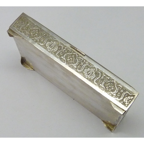 434 - A cigarette box, Turkish / Middle Eastern white metal 140 x 89mm.