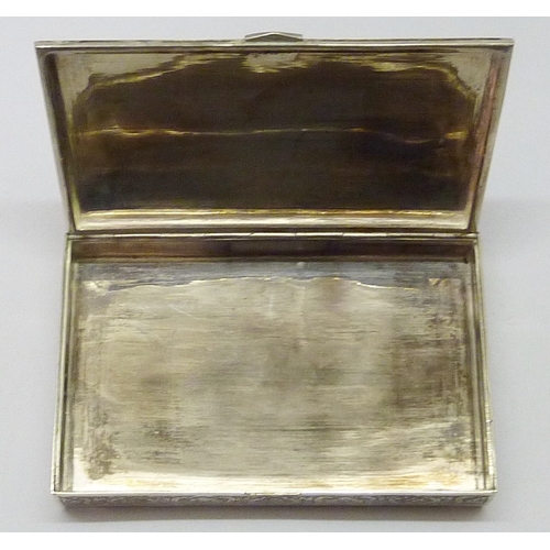 434 - A cigarette box, Turkish / Middle Eastern white metal 140 x 89mm.