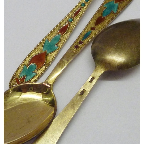 439 - Six matching Russian gilt white metal and enamel coffee spoons, late 20th cent. Each 115mm long.