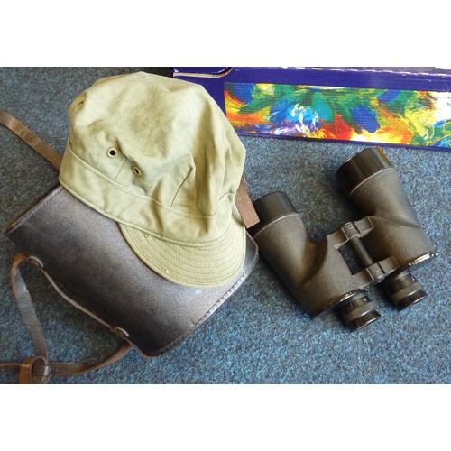 4 - A US Army fatigue cap, c1940s; a pair of Bausch and Lomb binoculars, cased; a signed Zimbabwean Shon... 