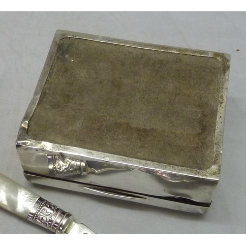 438 - A silver and hardwood cigarette case, a/f,  110 x 90mm; a silver and mother of pearl serving fork, 2... 