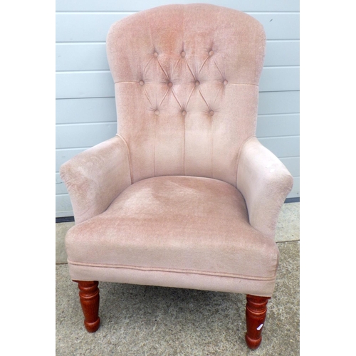 609 - A beige button back upholstered chair