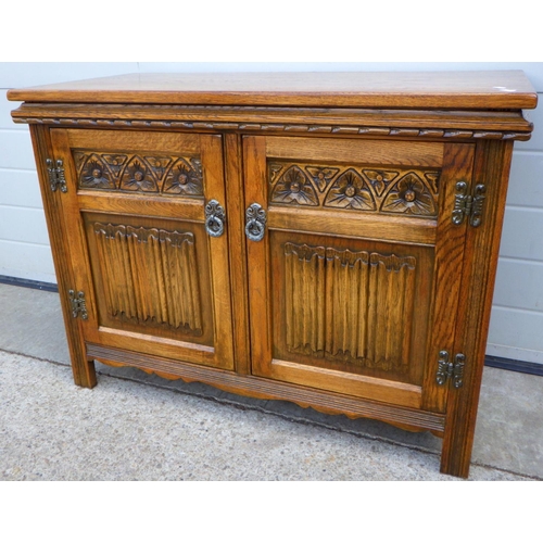 615 - An Old Charm oak record cabinet, 93cm wide