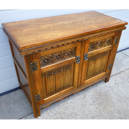 615 - An Old Charm oak record cabinet, 93cm wide