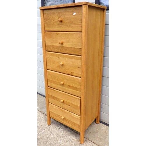 625 - A tall modern light oak chest of drawers, 55cm wide, 142cm tall