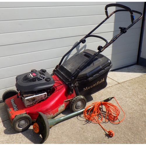 628 - A Mountfield petrol lawnmower together with a Black & Decker electric strimmer (2)