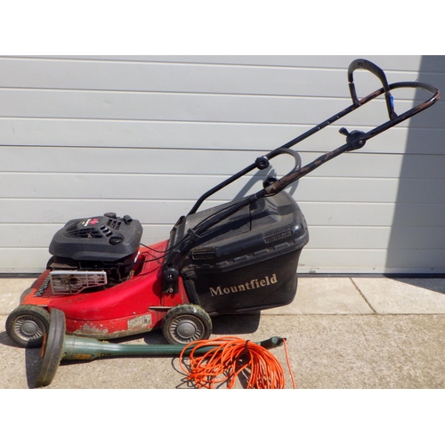 628 - A Mountfield petrol lawnmower together with a Black & Decker electric strimmer (2)