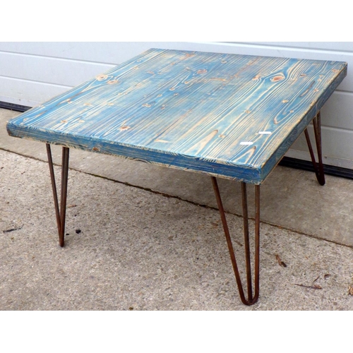 639 - A blue painted coffee table on metal legs, 68cm long