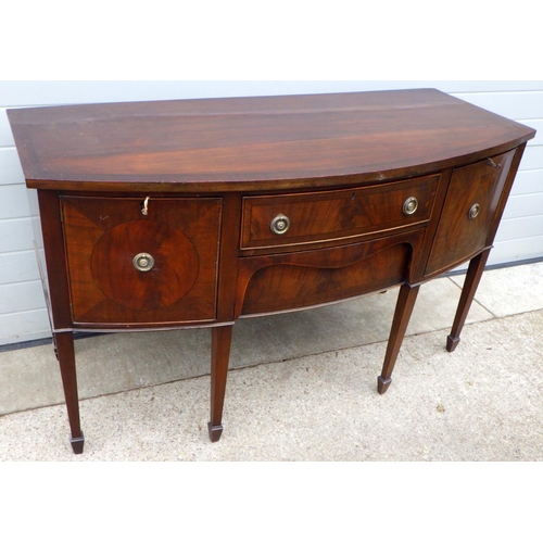 649 - A mahogany bowfronted sideboard, 153m wide