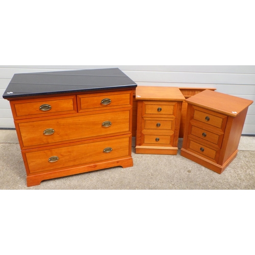 657 - A modern marble topped chest of drawers, 95cm wide, together with a pair of bedside chests and a hea... 