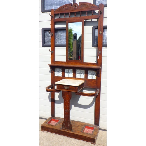 786 - A late Victorian oak hallstand, one hook broken, 92cm wide