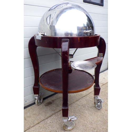 802 - A large dome topped meat trolley, veneer damage, 130cm tall approx