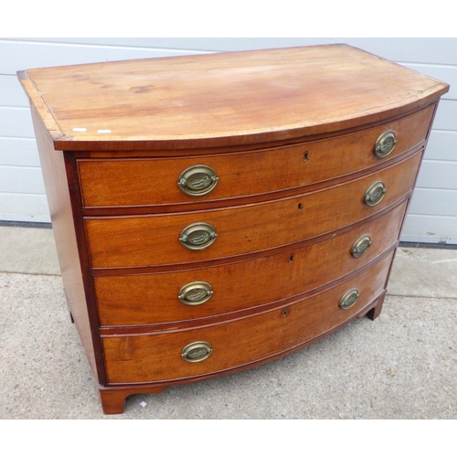 809 - A 19th cen mahogany bowfronted chest of drawers, a/f patched, 102cm wide