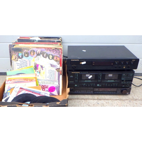 831 - A stereo together with a qty of records