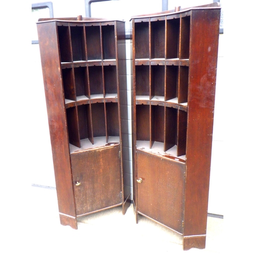 833 - A pair of 1930's oak/ply corner cupboards with pigeon holes, 160cm tall