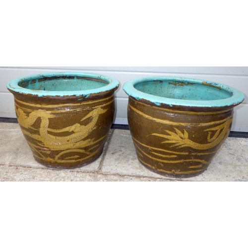 845 - Two dragon pattern earthenware planters, 39cm across, 28cm tall