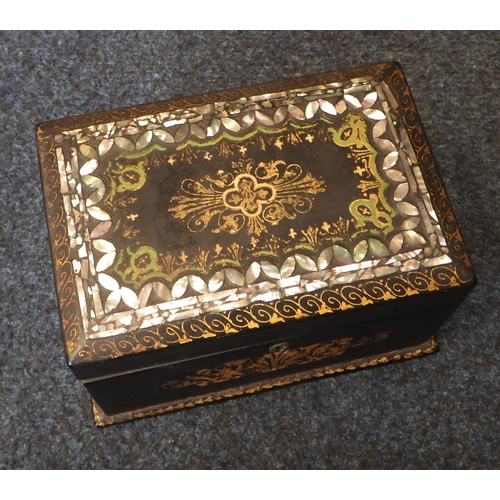 46 - A 19th C lacquered tea caddy 19cm wide