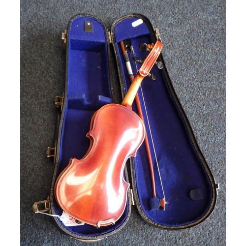 50 - A miniature cased Suzuki Violin