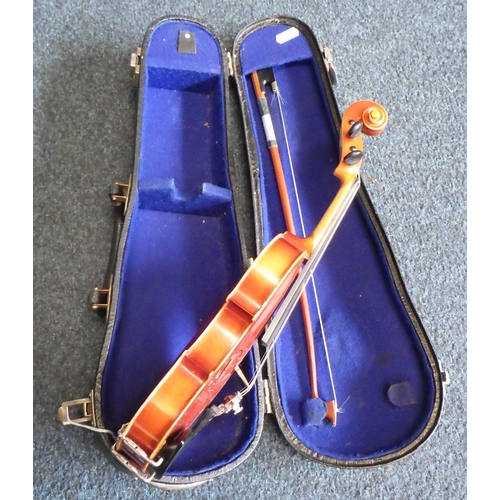 50 - A miniature cased Suzuki Violin